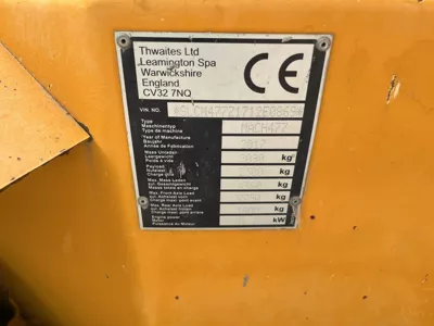 76877